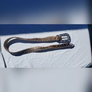 Brown‎ hair on hide belt